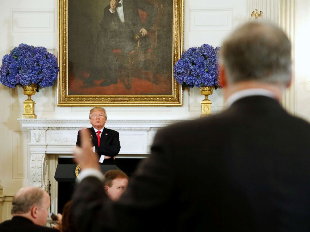 PHOTO: President Donald Trump looks on as Washington State Governor Jay Inslee (R) engages him during a discussion about school shootings with state governors from around the country at the White House, Feb. 26, 2018.