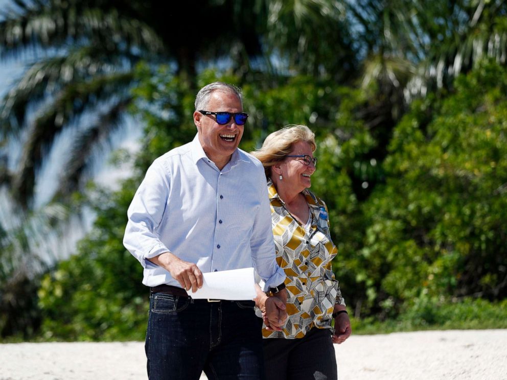 PHOTO: Democratic presidential candidate Washington Gov. Jay Inslee, and his wife, Trudi, walk up to speak at a news conference at the Everglades Holiday Park, June 24, 2019, in Fort Lauderdale, Fla.