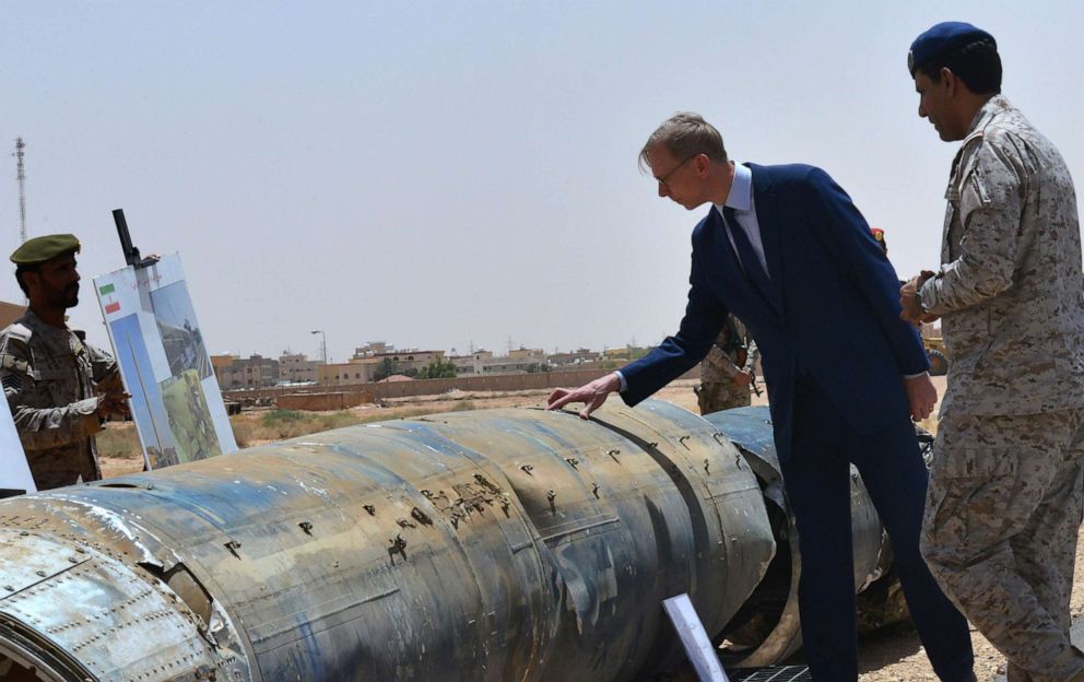 PHOTO: Brian Hook (2nd R), the US special representative on Iran, checks what Saudi officials said were Iranian remnants of a "cruise missile" that slammed into Abha airport on June 12, during a visit to an army base in al-Kharj, on June 21, 2019.