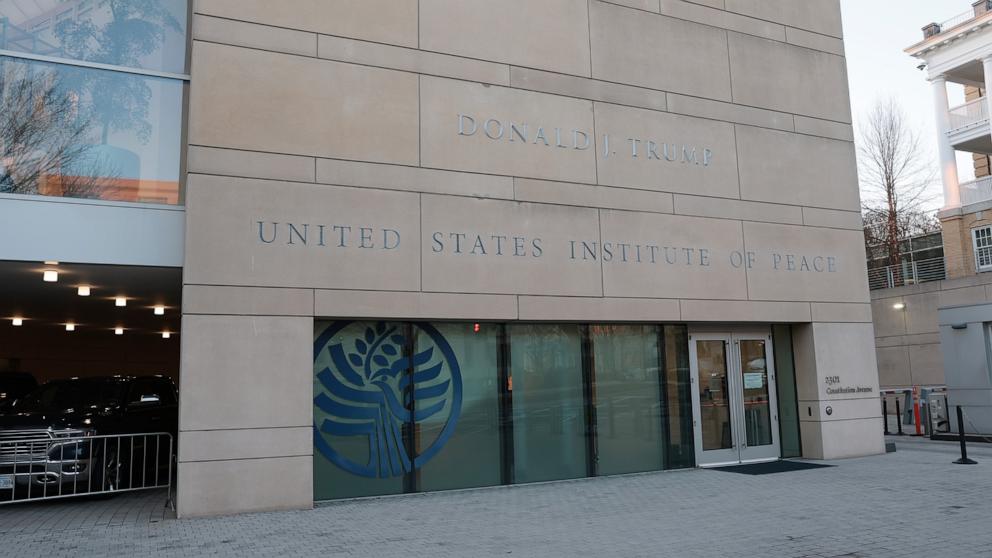 PHOTO: President Donald Trump's name is seen recently placed on the outside of the United States Institute of Peace building headquarters, December 3, 2025 in Washington.