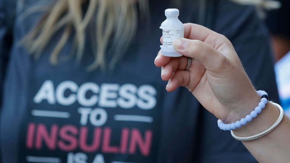 PHOTO: A patient holds a vial of insulin during a news conference outside the Olde Walkersville Pharmacy, July 28, 2019, in Windsor, Ont. 