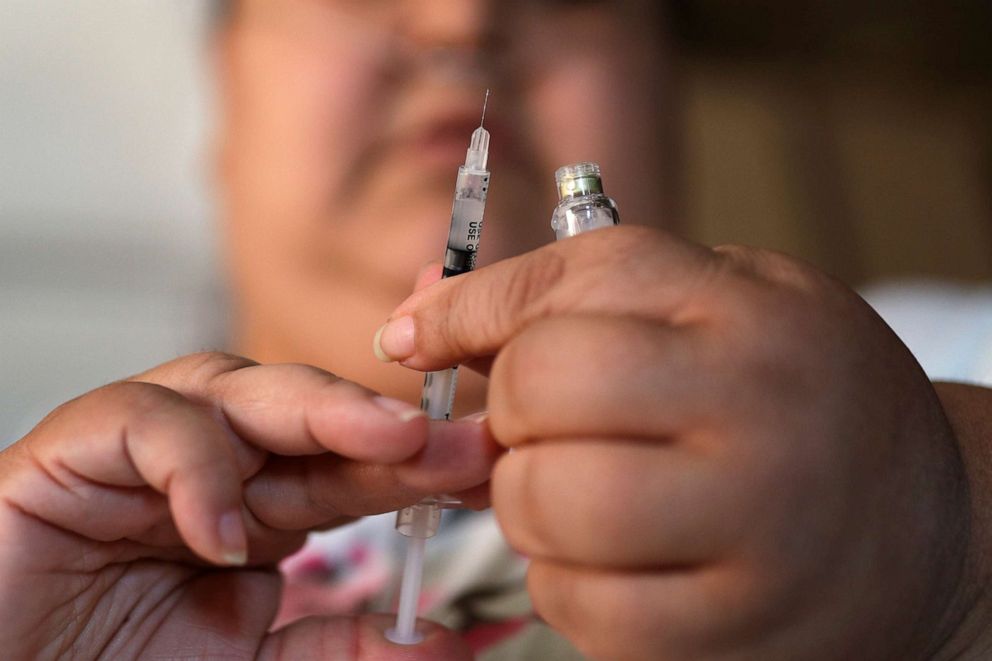 PHOTO: A woman with Type 2 diabetes prepares to inject herself with insulin at her home in Las Vegas, April 18, 2017.