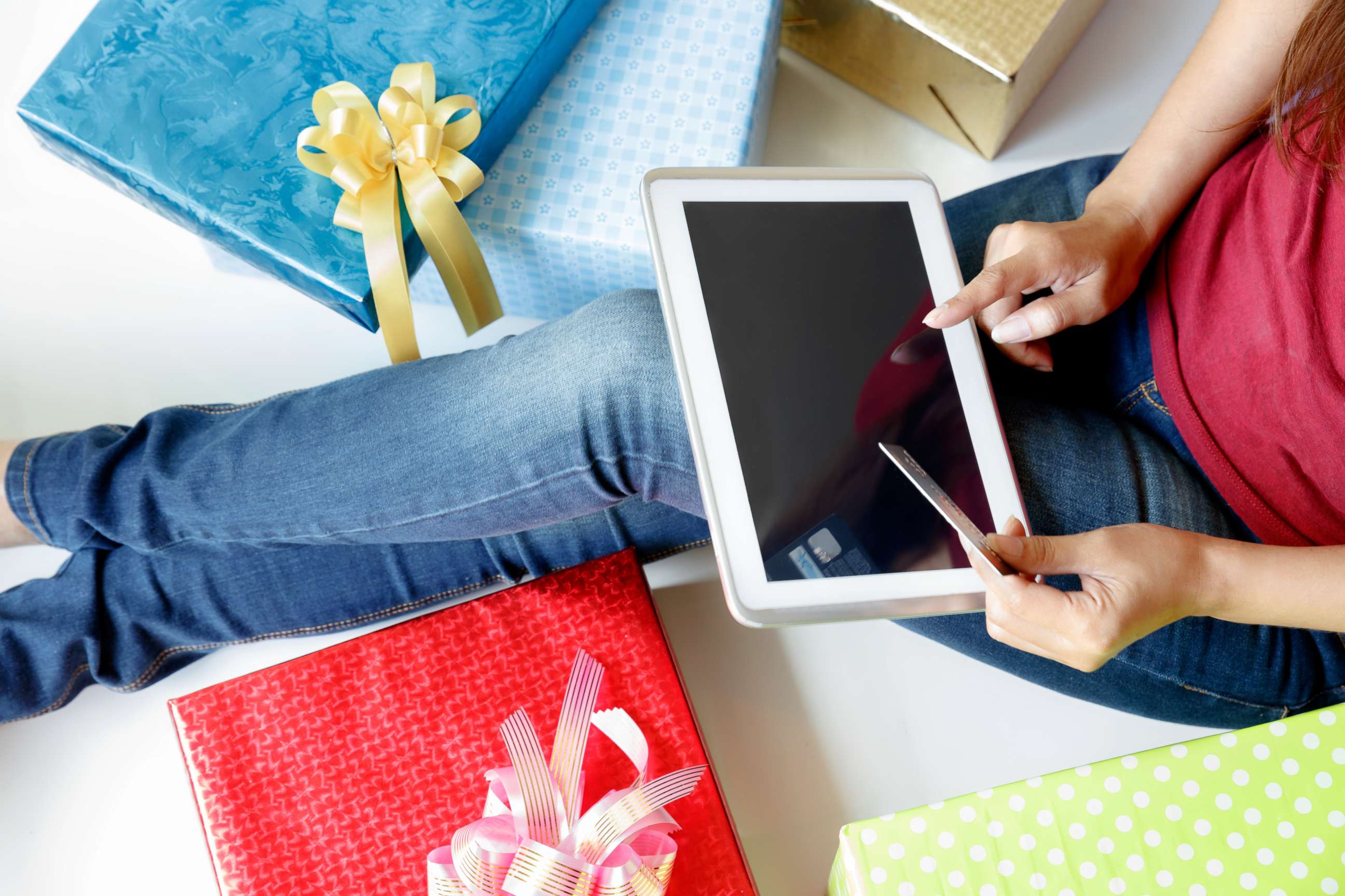 PHOTO: A woman shopping online using her credit card in this undated stock photo.