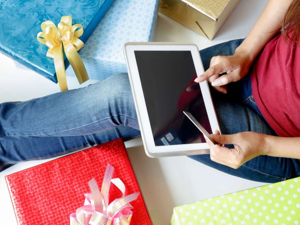 PHOTO: A woman shopping online using her credit card in this undated stock photo.