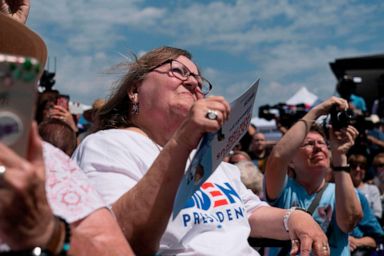 PHOTO: A supporter listens as Democratic presidential hopeful former Vice President Joe Biden speaks at the Des Moines Register Political Soapbox during a visit to the Iowa State Fair, Aug. 8, 2019, in Des Moines, Iowa.