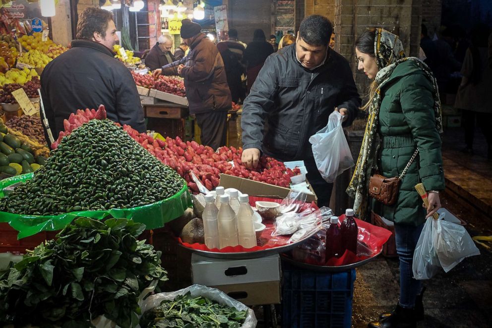 PHOTO: Iranians buy items to celebrate the upcoming Persian new year Noruz at Tajrish old bazaar in Tehran on March 08, 2019.