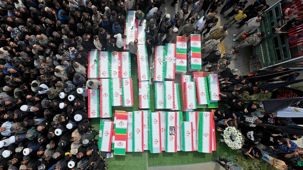 PHOTO: Coffins are assembled as funerals are held for students and staff from a girls' school, who authorities said were killed in a US-Israeli strike on February 28, on March 3, 2026, in Minab, Iran.