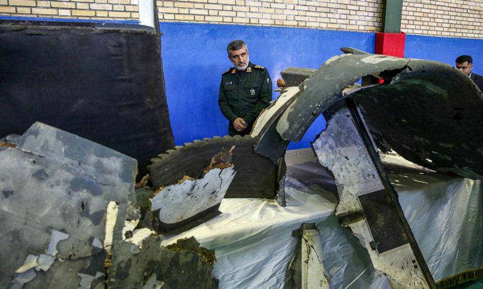 PHOTO: General Amir Ali Hajizadeh, Iran's Head of the Revolutionary Guard's aerospace division, looks at debris from a downed U.S. drone reportedly recovered within Iran's territorial waters, June 21, 2019, in Tehran.