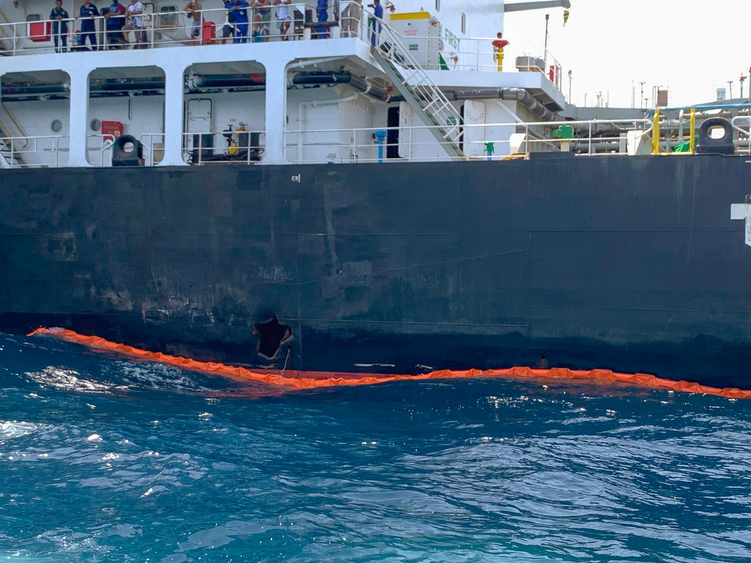 PHOTO: The damage to the Japanese oil tanker Kokuka Courageous from a limpet mine attack in the Gulf of Oman can be seen as the ship sails off the coast the United Arab Emirates, June 19, 2019.