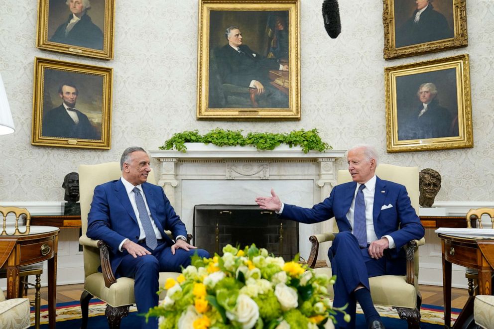 PHOTO: President Joe Biden, right, meets with Iraqi Prime Minister Mustafa al-Kadhimi, left, in the Oval Office of the White House, July 26, 2021. 