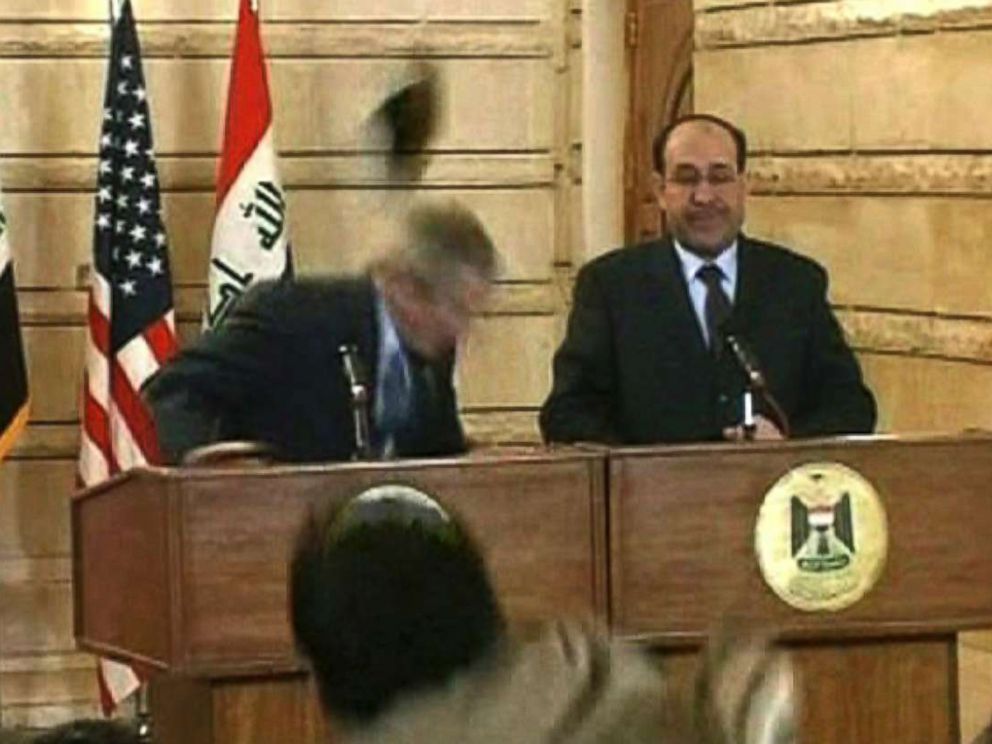 PHOTO: In this image from APTN video, Muntazar al-Zaidi, foreground, throws a shoe at President George W. Bush, who ducks, during a news conference with Iraq Prime Minister Nouri al-Maliki, Dec. 14, 2008, in Baghdad.