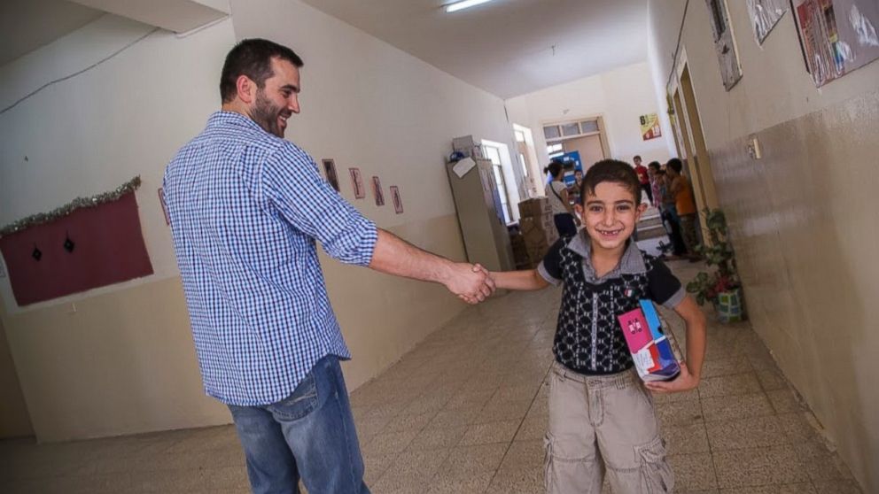 TentEd distributing shoes for 1st and 2nd graders at Garanawa Elementary School in Erbil on July 3, 2014