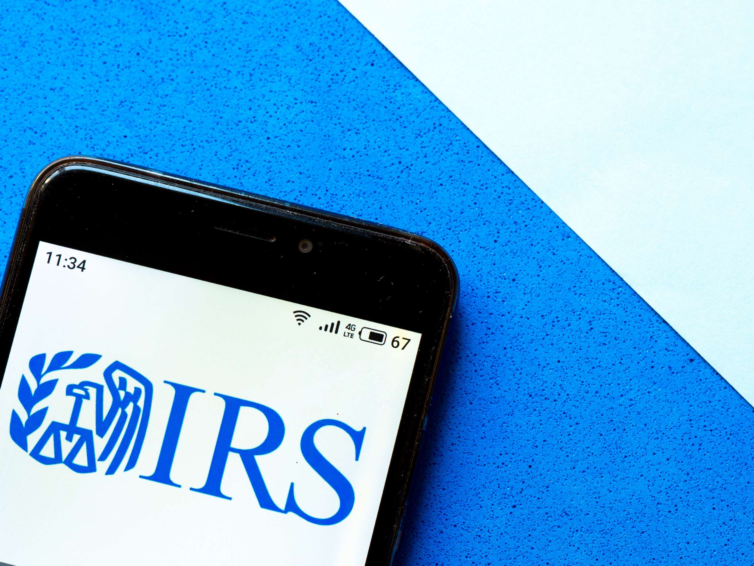 PHOTO: In this photo illustration an IRS logo seen displayed on a smartphone.