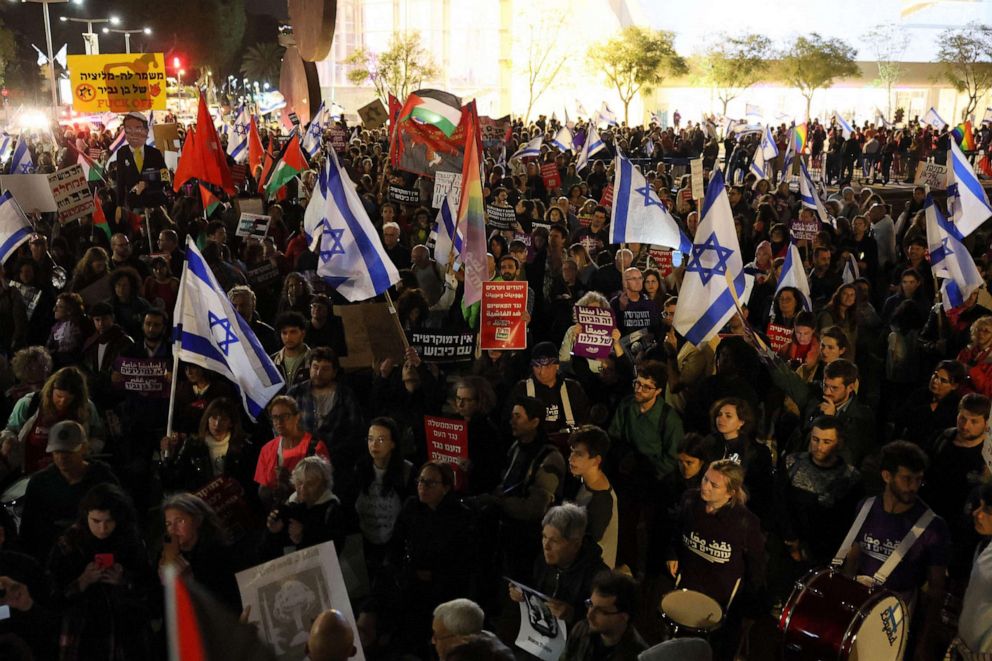 PHOTO: Demonstrators attend a protest against the Israeli governments controversial judicial reform bill in Tel Aviv on March 29, 2023.