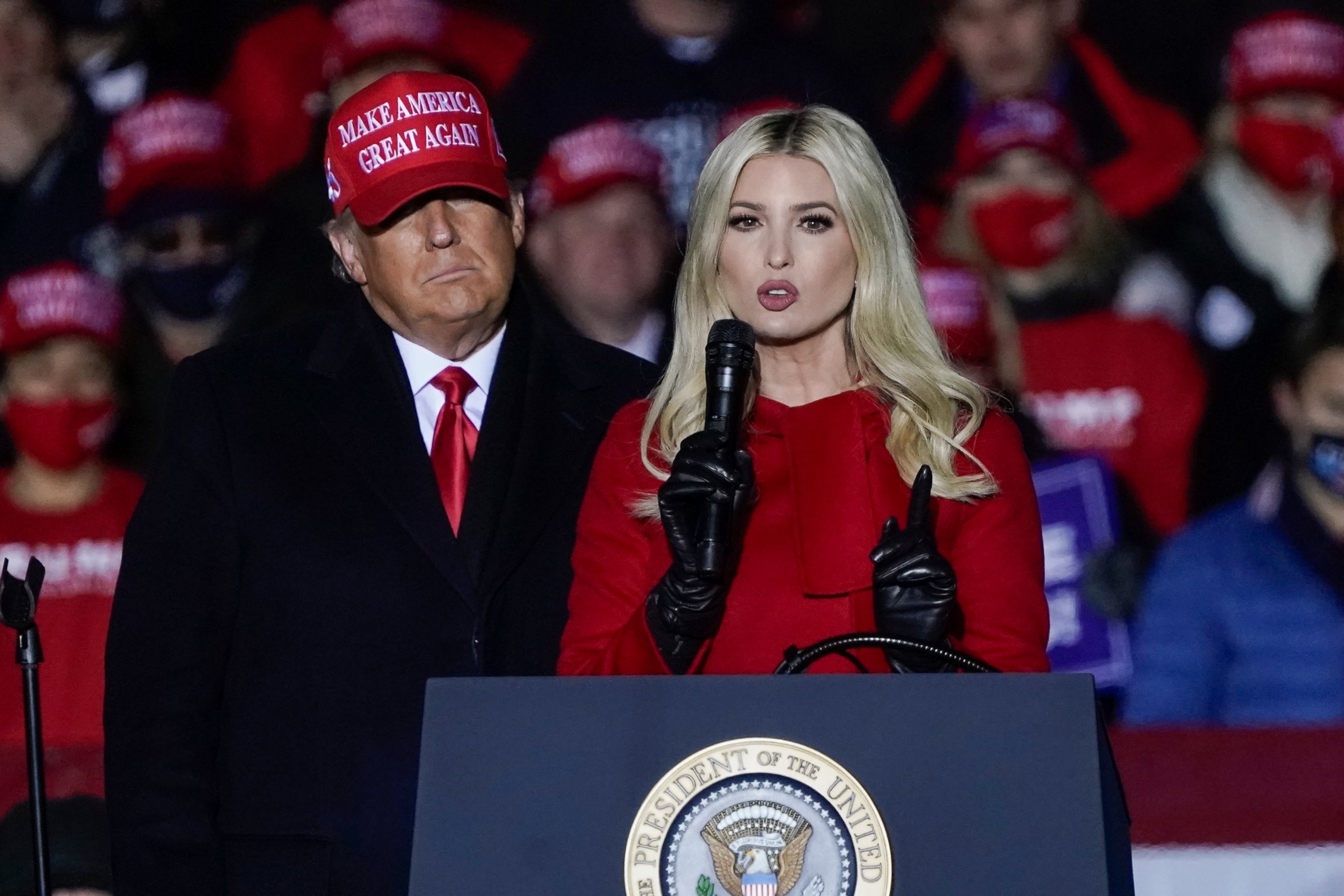 PHOTO: President Donald Trump watches as daughter Ivanka Trump speaks at a campaign event at the Kenosha Regional Airport, Nov. 2, 2020, in Kenosha, Wis.