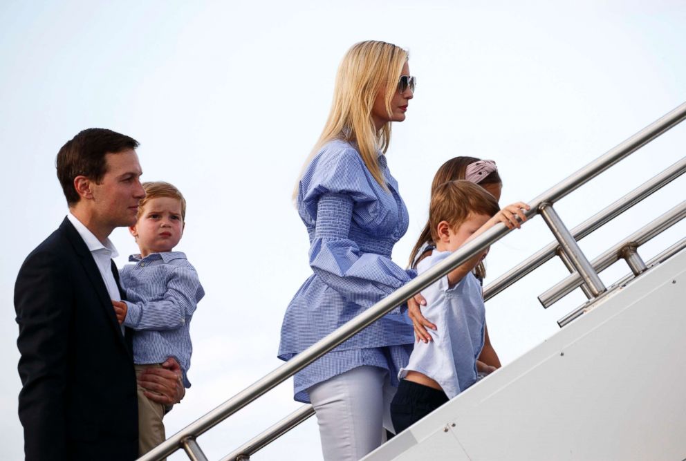 PHOTO: Jared Kushner, left, his wife Ivanka Trump, and their children, Theodore, second from left, Joseph, third from left, and Arabella, board Air Force One at Morristown Municipal Airport, in Morristown, N.J., July 29, 2018.