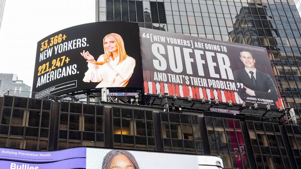 PHOTO: A billboard by The Lincoln Project depicts Ivanka Trump presenting the number of New Yorkers and Americans who have died due to COVID-19 and Jared Kushner with a Vanity Fair quote in Times Square, New York, Oct 22, 2020.