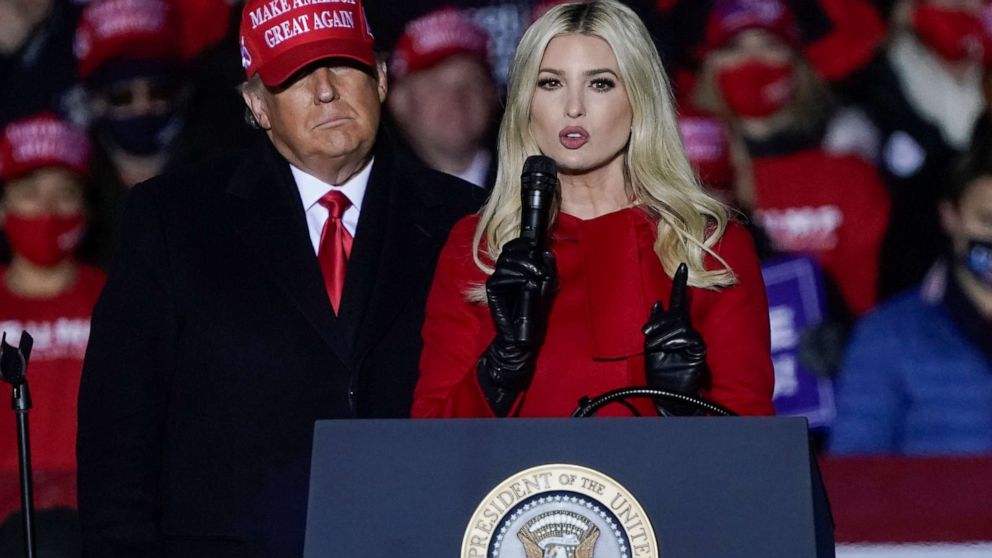 Ivanka Trump speaks at a campaign event on Nov. 2, 2020, while her father, President Donald Trump, watches in Kenosha, Wis. 