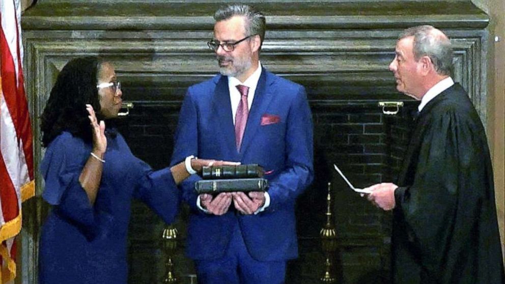 PHOTO: Justice Ketanji Brown Jackson takes her oath of office as Associate Justice of the United States Supreme Court before Chief Justice John Roberts in Washington, DC on June 30, 2022. 