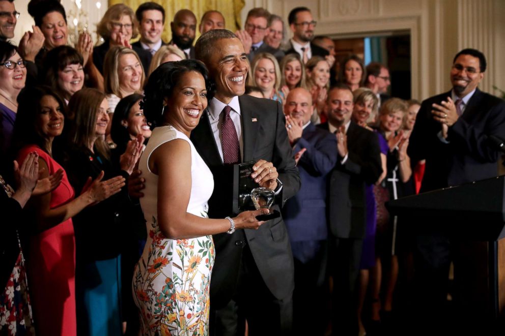 PHOTO: President Barack Obama poses for photographs with 2016 National Teacher of the Year Jahana Hayes of John F. Kennedy High School in Waterbury, CT, after presenting her with the crystal apple trophy at the White House, May 3, 2016, in Washington.