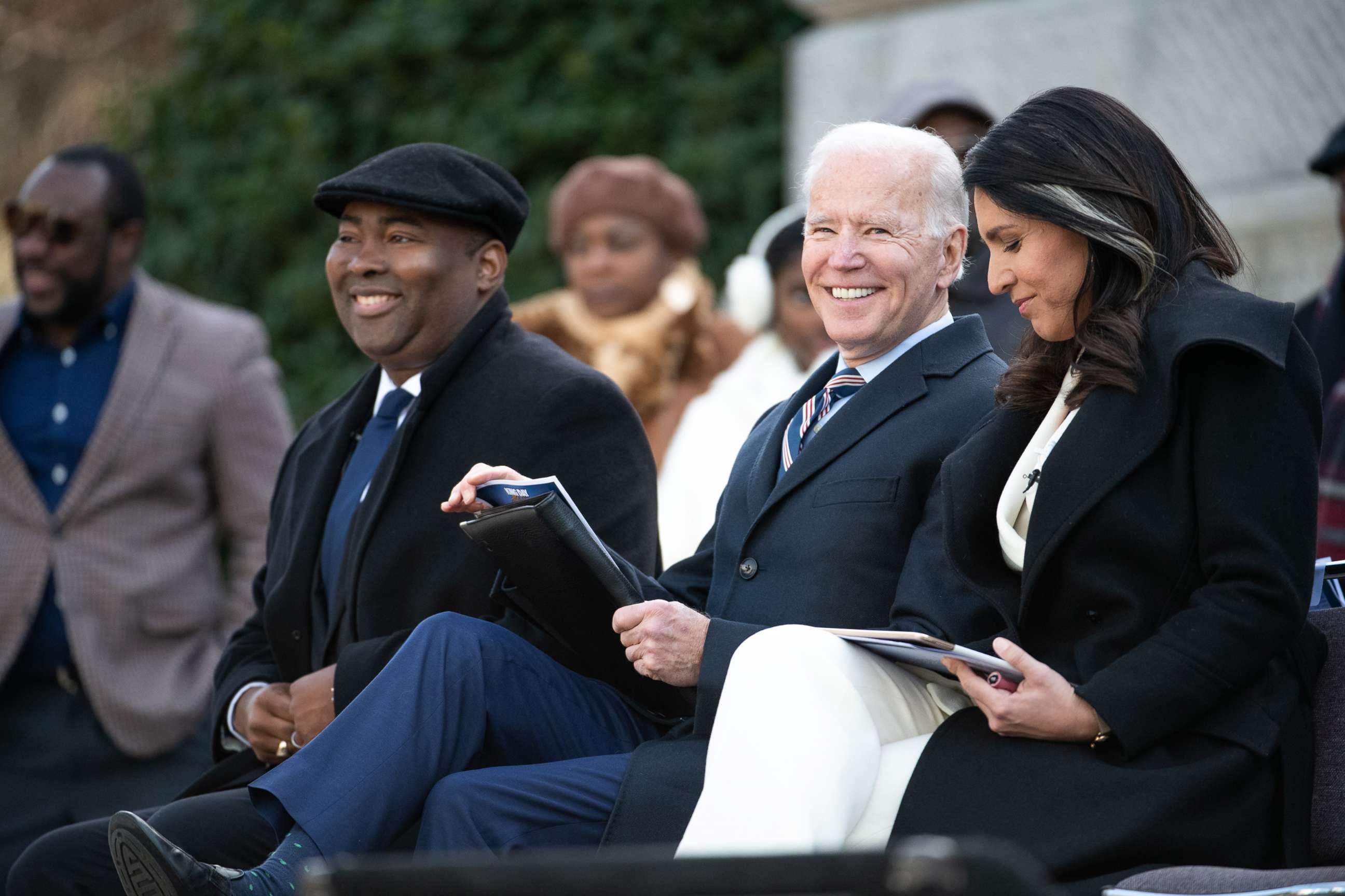 PHOTO: Senate candidate Jamie Harrison, left, sits with Democratic presidential candidates, former Vice President Joe Biden, center, and Rep. Tulsi Gabbard during the King Day celebration at the Dome March and Rally on Jan. 20, 2020, in Columbia, S.C.