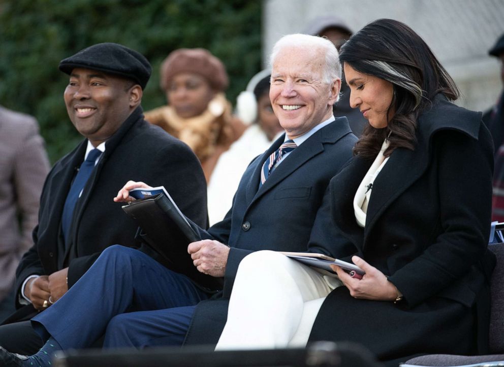 PHOTO: Senate candidate Jamie Harrison, left, sits with Democratic presidential candidates, former Vice President Joe Biden, center, and Rep. Tulsi Gabbard during the King Day celebration at the Dome March and Rally on Jan. 20, 2020, in Columbia, S.C.
