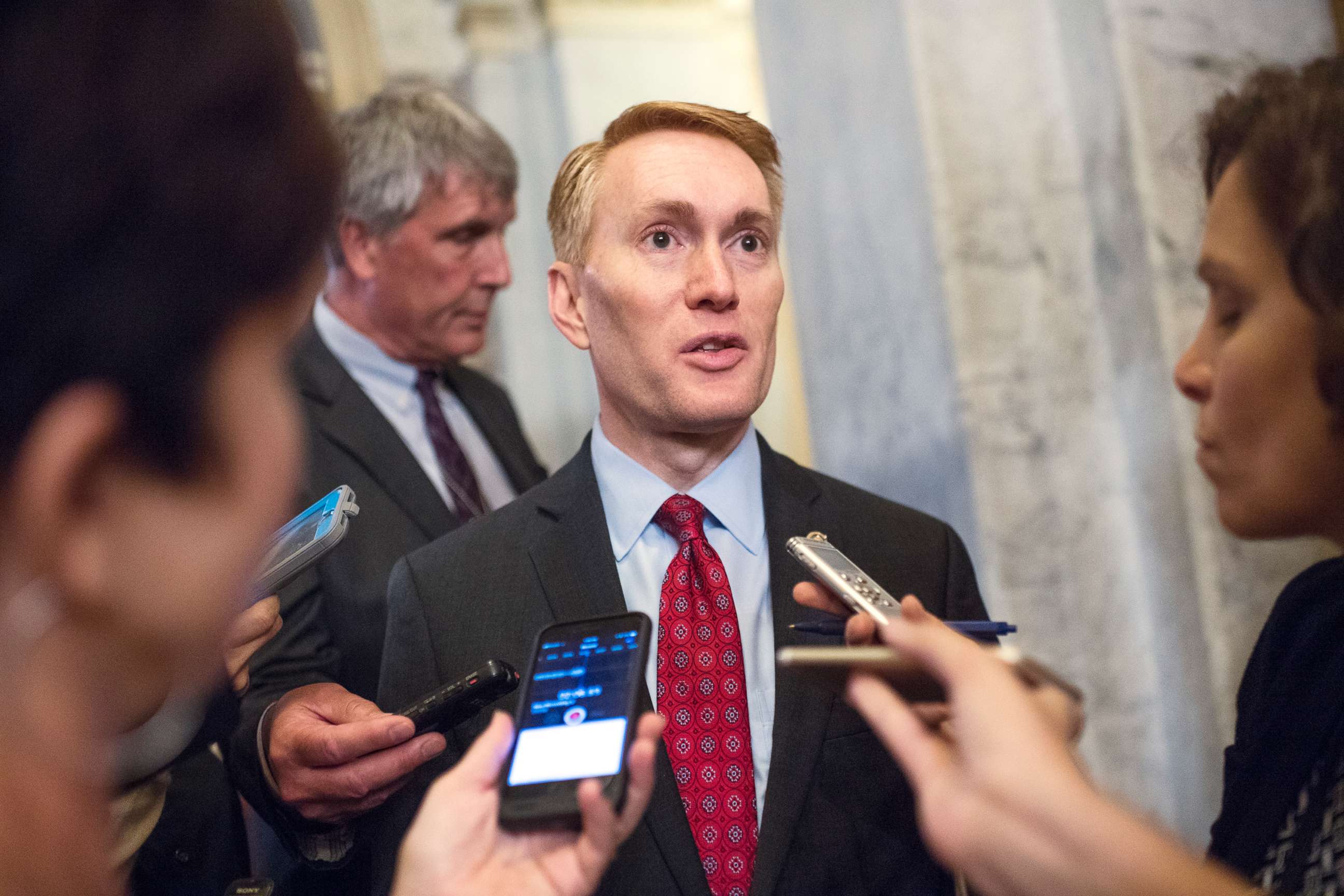PHOTO: Sen. James Lankford talks with reporters after the Senate Policy luncheons in the Capitol in Washington, July 17, 2018.