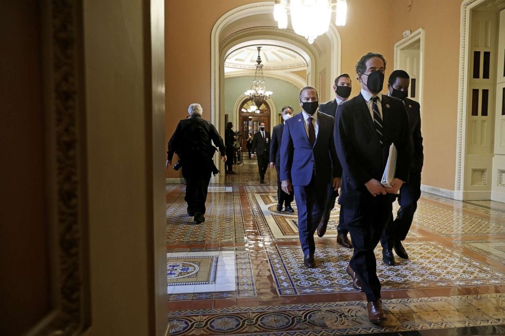 PHOTO: House impeachment managers, led by Rep. Jamie Raskin leave the Senate Chamber after the conclusion of former President Donald Trump's impeachment trial at the U.S. Capitol, Feb. 13, 2021, in Washington, DC. 