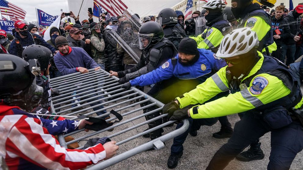 PHOTO: Violent insurrectionists loyal to President Donald Trump try to break through a police barrier at the Capitol in Washington, Jan. 6, 2021.