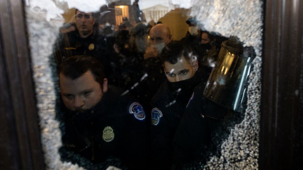 PHOTO: Police defend the US Capitol as supporters of President Donald Trump breach security in Washington on January 06, 2021.