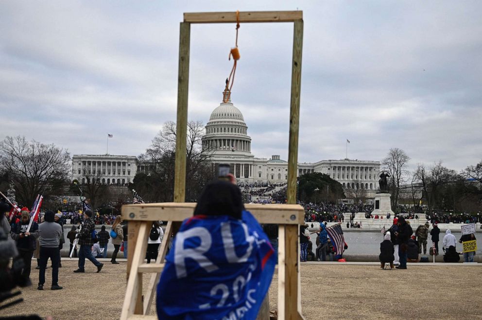 PHOTO: Supporters of President Donald Trump with a makeshift noose, gather near the U.S. Capitol on Jan. 6, 2021, in Washington, D.C. 