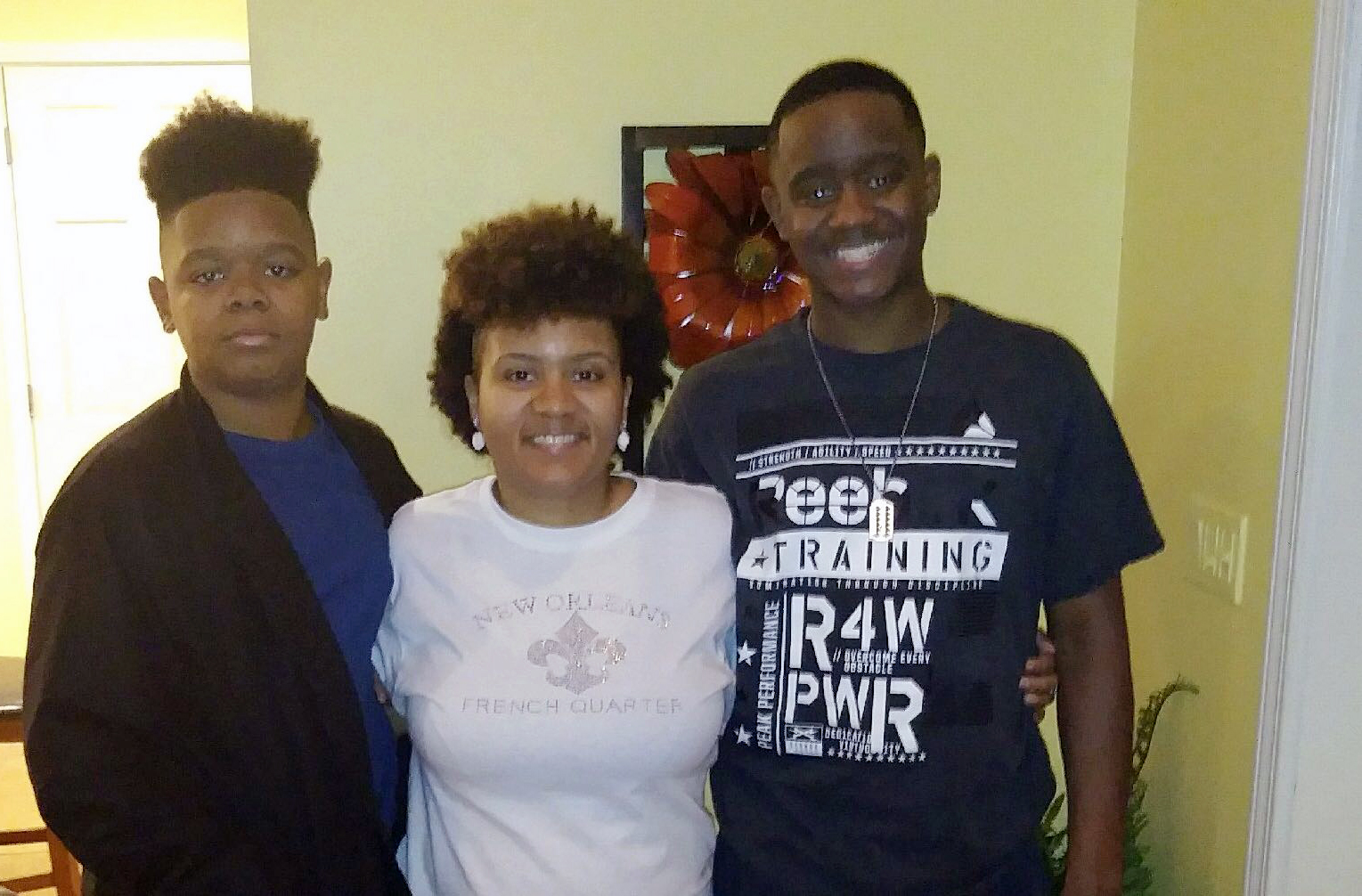 PHOTO: Jana Frierson with her two sons Johnithan (Spanky) on the left and Lester Jr (LeLe) on the right in this undated file photo.