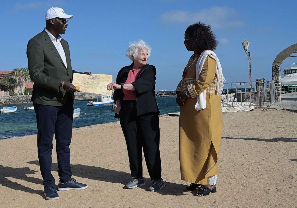 PHOTO: In this Jan. 21, 2023, file photo, Treasury Secretary Janet Yellen receives an award diploma of Great Pilgrim from lawyer and Goree's mayor Augustin Senghor (L) during a visit on Goree Island off the coast of the city of Dakar.