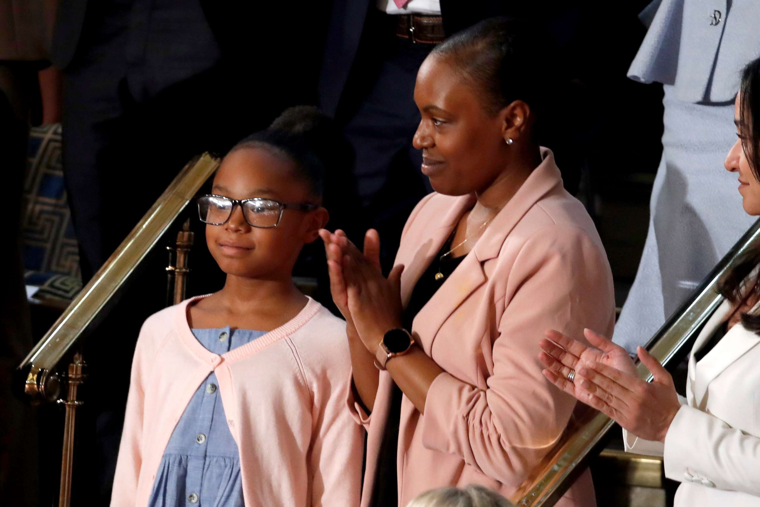 PHOTO: Janiyah, left, and Stephanie Davis of Philadelphia, listen as President Donald Trump delivers his State of the Union address to a joint session of Congress on Capitol Hill in Washington, Feb. 4, 2020.