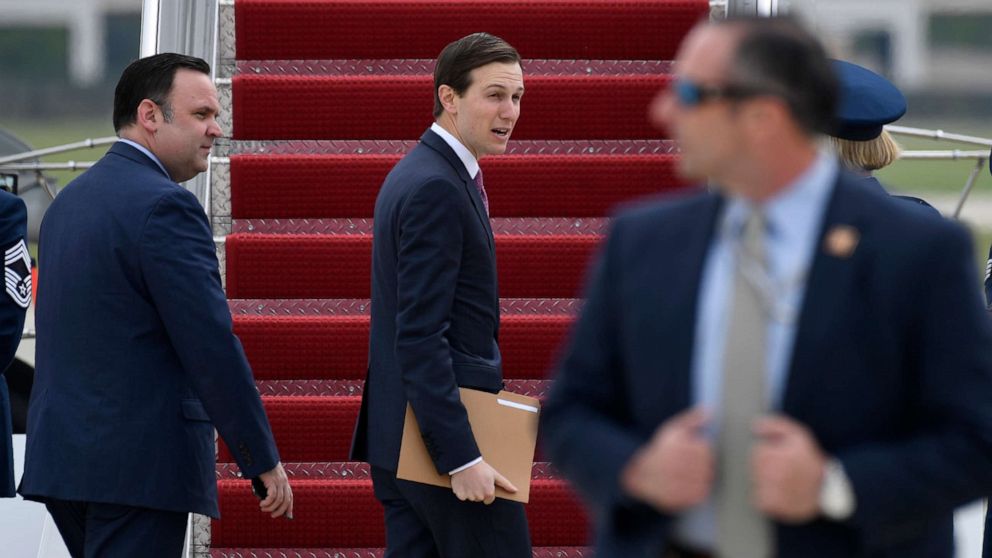 PHOTO: White House senior adviser Jared Kushner, center, boards Air Force One at Andrews Air Force Base in Md., May 5, 2020.