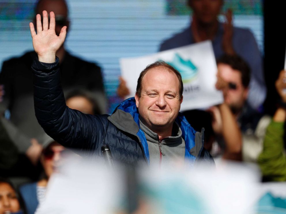 PHOTO: Jared Polis, Colorados Democratic candidate for governor, waves to the crowd during a rally with young voters on the campus of the University of Colorado, Oct. 24, 2018, in Boulder, Colo.