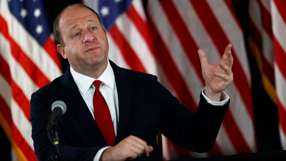 PHOTO: Colorado Governor Jared Polis makes a point during a news conference on the state's efforts to contain the spread of the new coronavirus, July 9, 2020, in Denver.