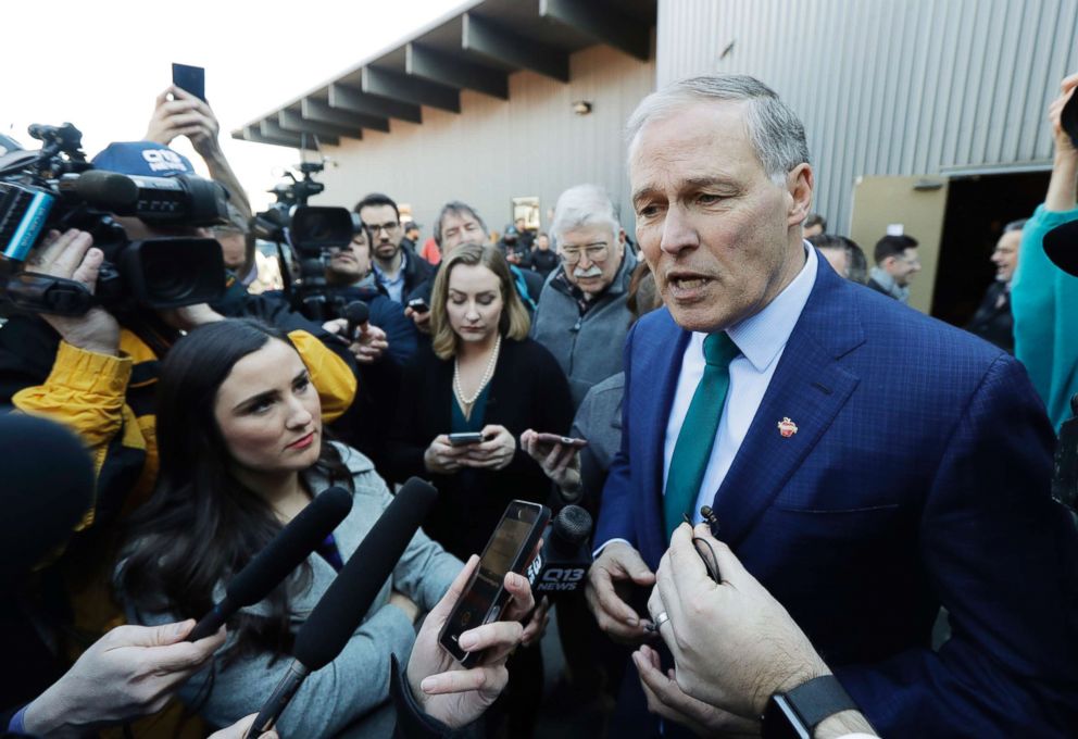 PHOTO: Washington Governor Jay Inslee answers questions from reporters after speaking at a campaign event in Seattle, March 1, 2019.