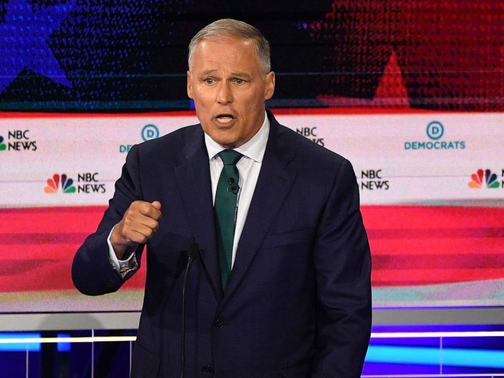 PHOTO: Jay Inslee participates in the first Democratic primary debate hosted by NBC News at the Adrienne Arsht Center for the Performing Arts in Miami, Florida, June 26, 2019.