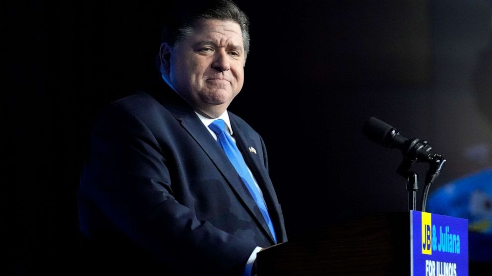 FILE PHOTO: Illinois Gov. J.B. Pritzker looks to supporters in Chicago on Nov. 8, 2022, after he won reelection.