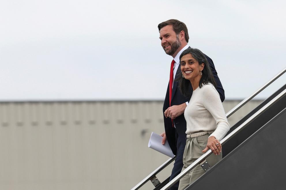 PHOTO: Republican vice presidential nominee Sen. JD Vance, R-Ohio, left, and his wife Usha Vance arrive to Minneapolis/St. Paul International airport in Minneapolis, Oct. 14, 2024. 