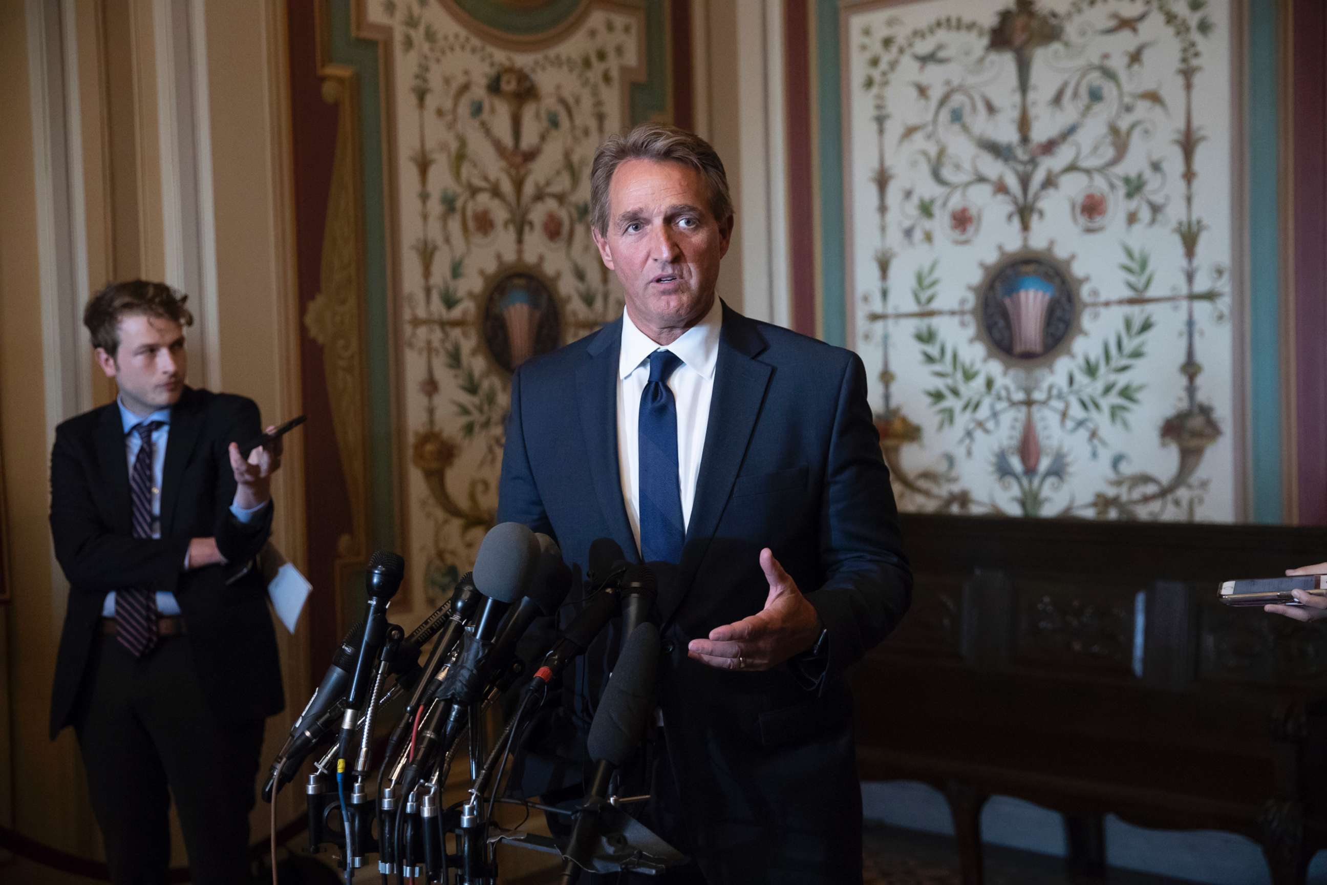 PHOTO: Sen. Jeff Flake speaks with reporters on Capitol Hill in Washington, D.C., June 13, 2018.