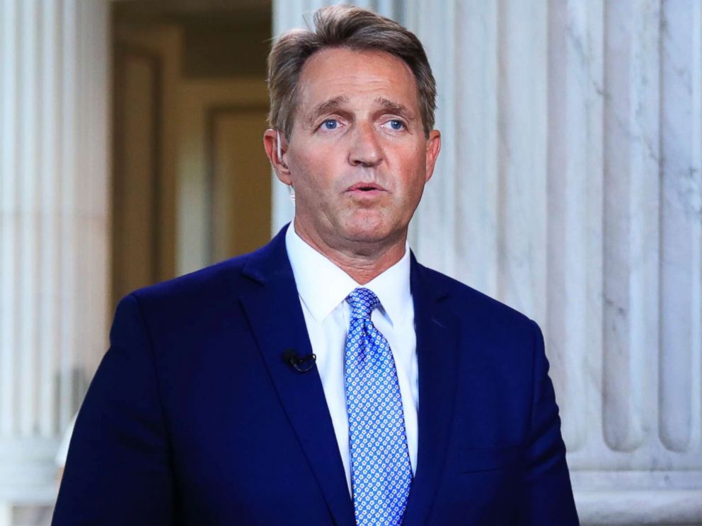 PHOTO: Sen. Jeff Flake speaks during a television interview on Capitol Hill in Washington, D.C., Oct. 24, 2017.