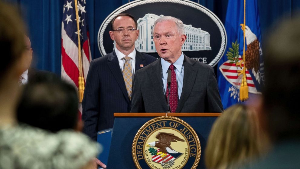 Attorney General Jeff Sessions, accompanied by Deputy Attorney General Rod Rosenstein, speaks at a news conference to announce an international cybercrime enforcement action at the Department of Justice, July 20, 2017, in Washington. 