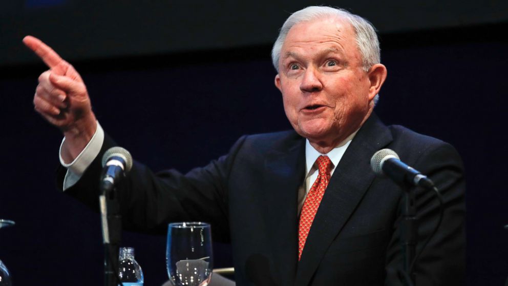 Attorney General Jeff Sessions reacts to the audience as he arrives to speak at the Federalist Society 2017 National Lawyers Convention at the Mayflower Hotel in Washington, Nov. 17, 2017, about maintaining and strengthening the rule of law. 