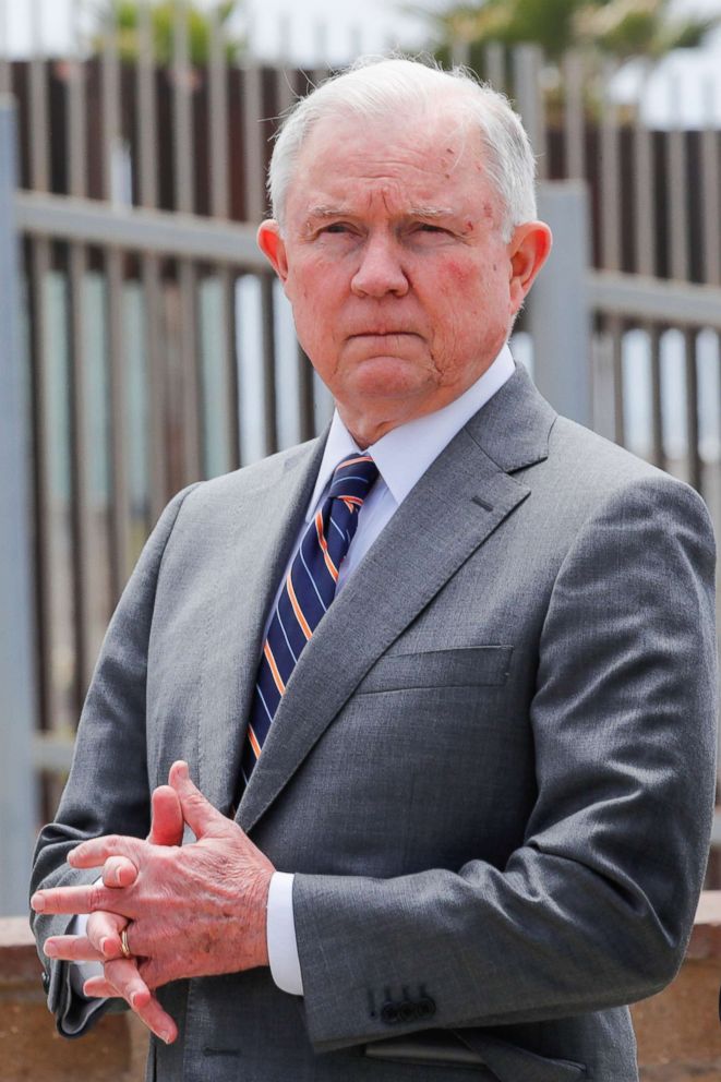 PHOTO: Attorney General Jeff Sessions looks on during a news conference next to the U.S.-Mexico border wall to discuss immigration enforcement actions of the Trump Administration near San Diego, Calif., May 7, 2018. 