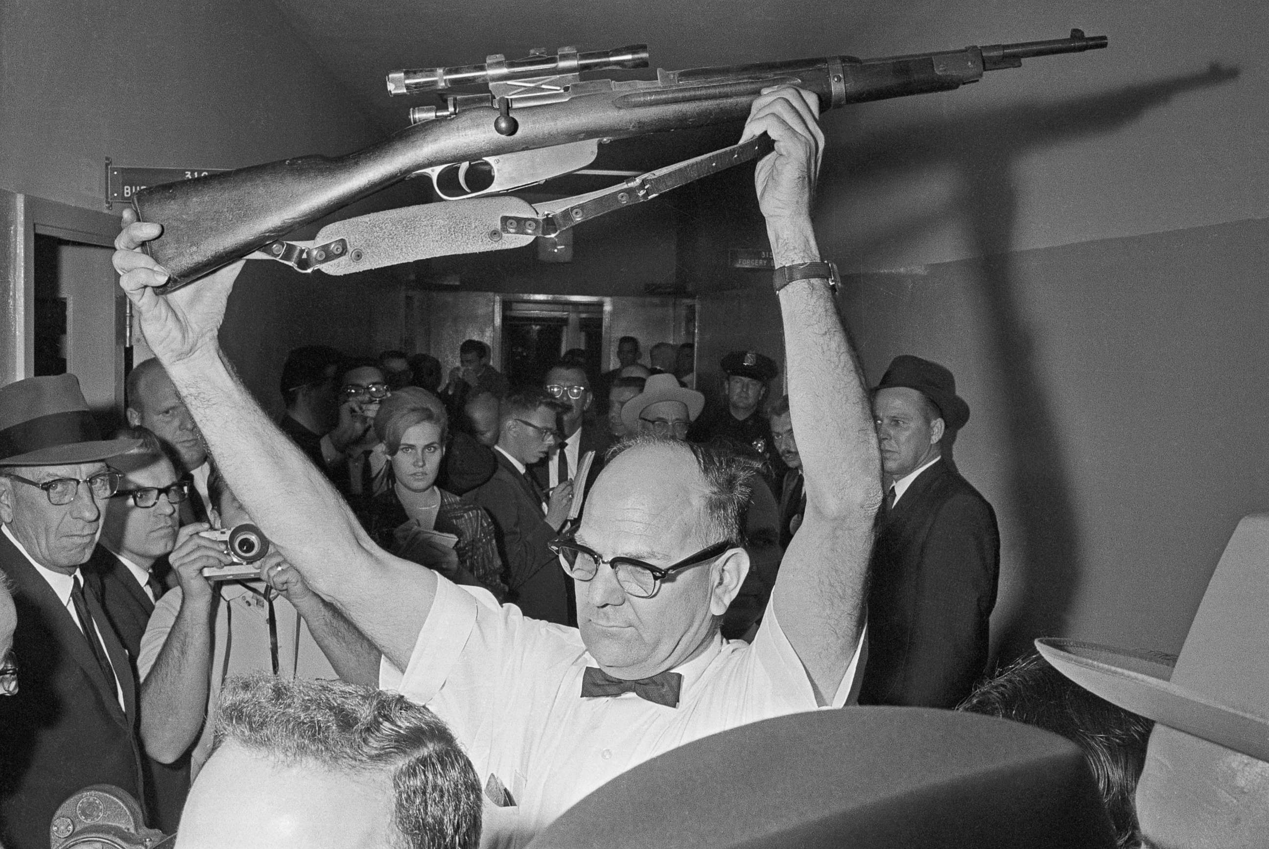 PHOTO: A Dallas policeman holds up the rifle used to kill President John F. Kennedy on Nov. 22, 1963 in Dallas. 