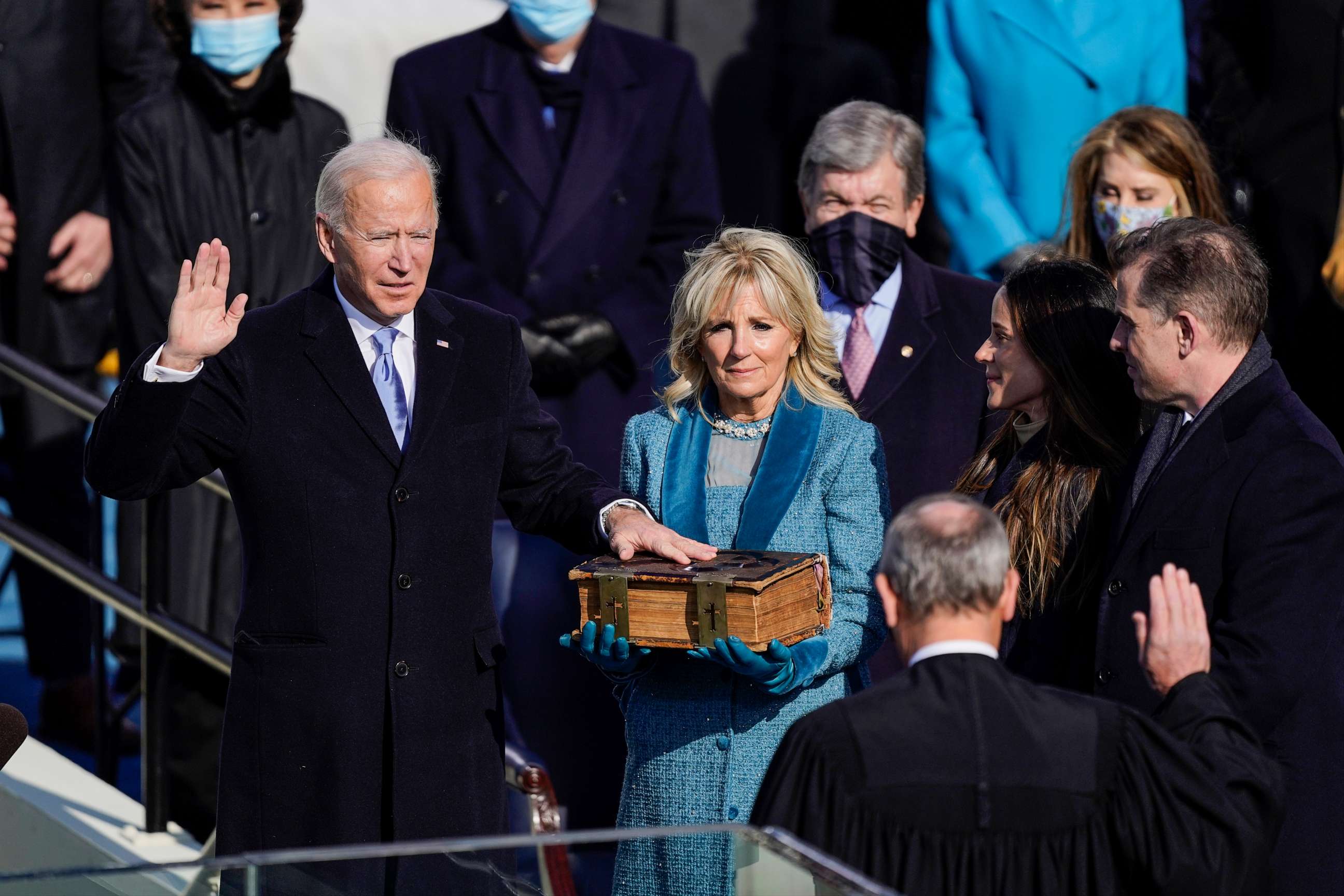 PHOTO: President-elect Joe Biden takes the oath of office from Supreme Court Chief Justice John Roberts as his wife First Lady-elect Jill Biden stands next to him during the 59th presidential inauguration in Washington, Jan. 20, 2021.