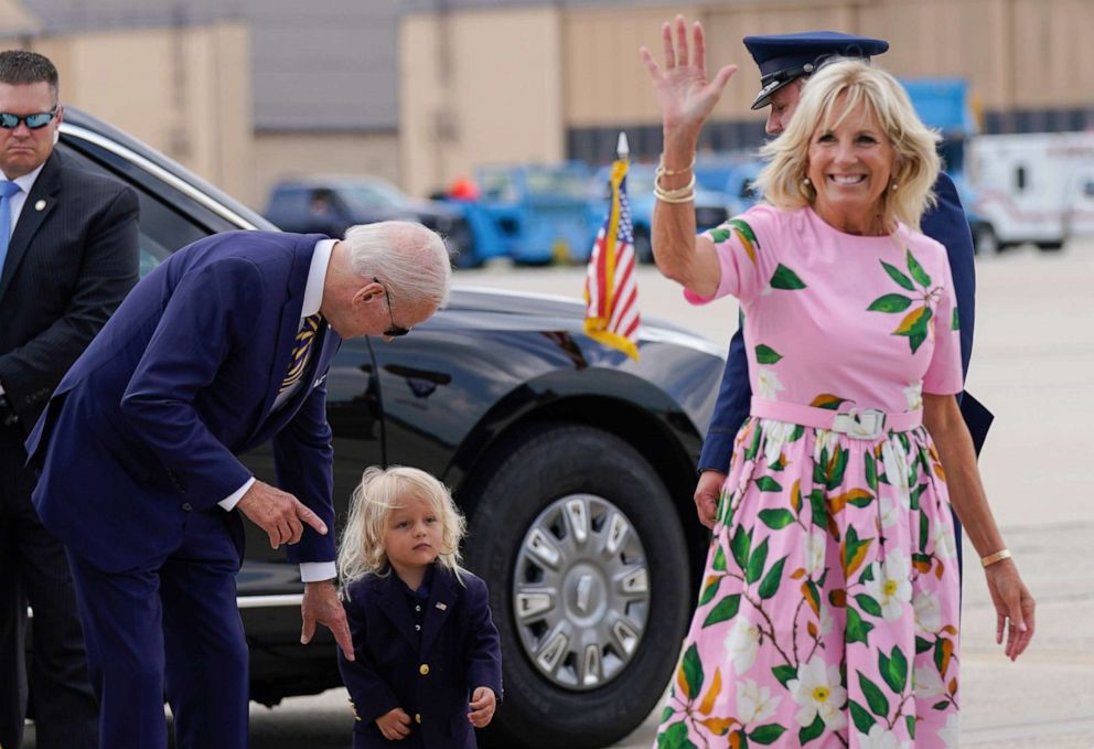 PHOTO: President Joe Biden looks at his grandson Beau Biden as first lady Jill Biden waves and walks to board Air Force One at Andrews Air Force Base, Md., Aug. 10, 2022.