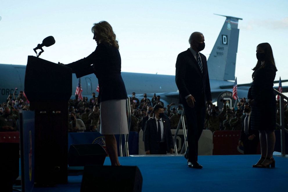 PHOTO: First Lady Jill Biden speaks as President Joe Biden arrives on the podium prior to addressing U.S. Air Force personnel and their families stationed at Royal Air Force Mildenhall, Suffolk, England, on June 9, 2021.
